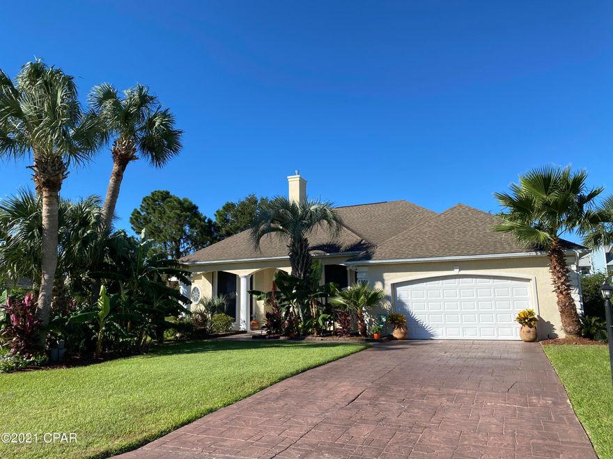 Well kept home in desirable Palm Bay with too many upgrades to list. This former Parade of Homes house has large open floor plan with 4 bedrooms, 3 full bathrooms, tropical backyard with inground pool and waterfall feature.  The split bedroom floor plan offers raised ceilings throughout, crown molding, tile floors, columns, arched openings, custom blinds, lots of natural light and lots of storage. The left side of home offers oversized master suite that opens to the lanai with walk in closet and master bath with large walk in shower and jacuzzi garden tub. The formal living room also opens to a lanai with beautiful pool, tropical landscaping, arched and column wall.  Formal dining and a study or fourth bedroom just off the large foyer, formal living room and family room.  Recent upgrades: new sink, new garbage disposal, new dishwasher and three pantries.  The family room has gas fireplace with wall switch.  The additional two bedrooms are separate and share full bathroom with double vanity.  The home is wired for security system and rain soft water conditioning system.  There is additional storage above all the bedroom closets and also in the attic with flooring and shelves.  Outside offers sprinkler system with well, lots of LED lighting controlled by remote and solar lighting. The lanai has roll down sunshades to provide privacy and block the sun.  Call to see today!