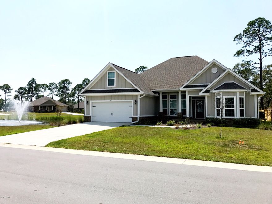 The outstanding Emma Plan with open kitchen with large island in the kitchen overlooking family room.  Almost $30,000 in upgrades  were added to this home. Crown Molding in the tray ceilings in Foyer, Family Room, Dinning Room and Master Bedroom. Bonus Room over the Garage. Built on wooded lot next to pond within walking distance of Fabulous NEW Pool and Picnic Area!!