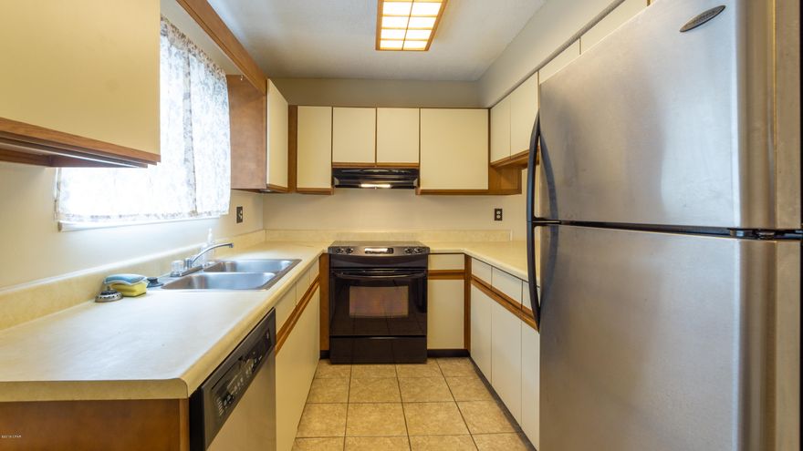 Great deal on the 2 Br/ 2.5Ba unit located just off 11th Street and is close to everything.  Condo is in great condition and has New Carpet and updated amenities with the pool being completely refinished and new pool safety fencing. The Complex has a New Roof and Siding and is really looking good, the units Upstairs Window has been ordered and is being replaced. Price has just been lowered so call for a showing appointment or contact your Agent for an appointment.