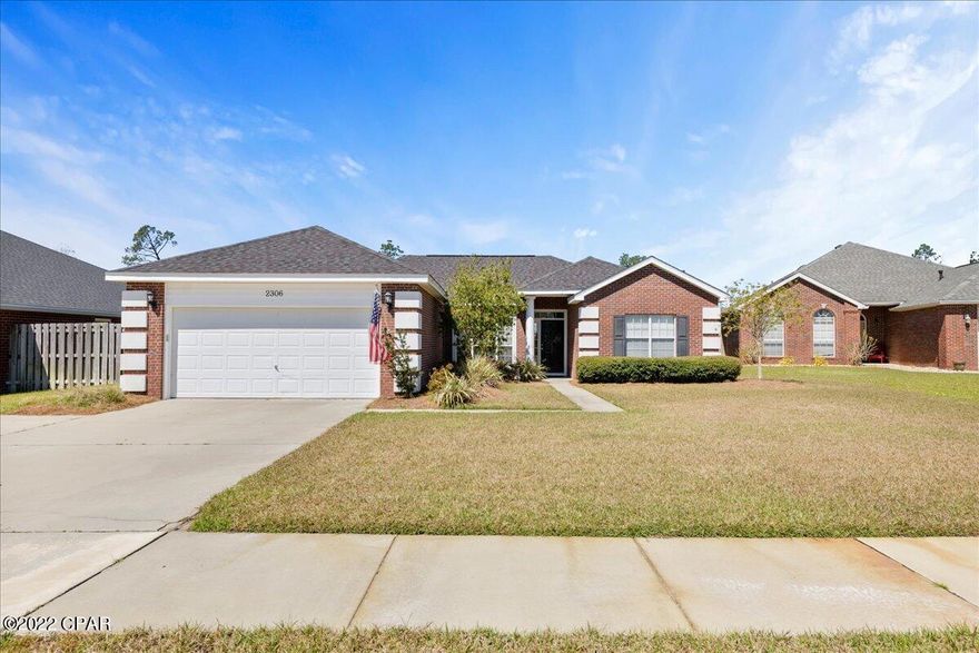 CURRENTLY UNDER CONTRACT, SELLER ACCEPTING BACKUP OFFERS. This home has the perfect floor plan for a growing family and has custom features that you won't find in a lot of the new construction today.  A 3 bedroom 2 bath split floor plan with over 1800 square feet, a large living room with beautiful gas fireplace, hardwood flooring, formal dining room,and a large kitchen with butler window. The kitchen features granite counter tops, custom cabinets and stainless appliances. There is a granite island in the kitchen for added cabinet and counter space for eating. The master suite is spacious and overlooks the backyard. The master bath has double vanity, water closet, large soaking tub and shower combination, water closet and huge walk-in closet. Outside is a large fenced in backyard (perfect for a swimming pool), sprinkler system, lots of established landscaping and curb appeal and covered patio for grilling and family time. This home is located on a cul-de-sac. Camryn's Crossing is a wonderful subdivision with low annual association dues and features sidewalks and street lights. This location is just minutes to shopping, the post office and schools. This home received a new roof after Hurricane Michael and it is NOT IN A FLOOD ZONE.