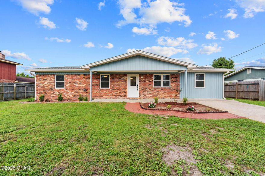 CURRENTLY UNDER CONTRACT, SELLER WILL CONSIDER BACKUP OFFERS. This 3-bedroom, 2-bathroom home features a spacious FLEX room that can easily serve as a fourth bedroom, home office, gym, or playroom—whatever fits your lifestyle. Completely renovated in 2020, energy efficiency shines with PAID-OFF solar panels (average electric bill $25/month), Low-E windows, a 2020 roof, updated electrical, water heater, and HVAC system. The heart of the home is the large, open kitchen offering granite countertops, stainless steel appliances including a built-in wine cooler, ample storage space and cabinetry, breakfast bar seating, and plenty of room to gather in the dining area nearby. The living room features a wood burning fireplace and tons of natural light pouring in from the windows and French doors leading to the backyard. Durable LVP flooring runs throughout, complemented by recessed lighting, fresh paint, and modern bathrooms. A detached, oversized one-car garage offers ample storage or workspace. The home sits on nearly a quarter acre with established trees for added privacy. It is also on a dead-end road so minimal traffic! The cost savings to the buyer continue with a completed survey, a wind mitigation report dated July 2023, and the washer and dryer convey! Don't miss your chance to own this move-in-ready home with modern features and minimal energy costs.