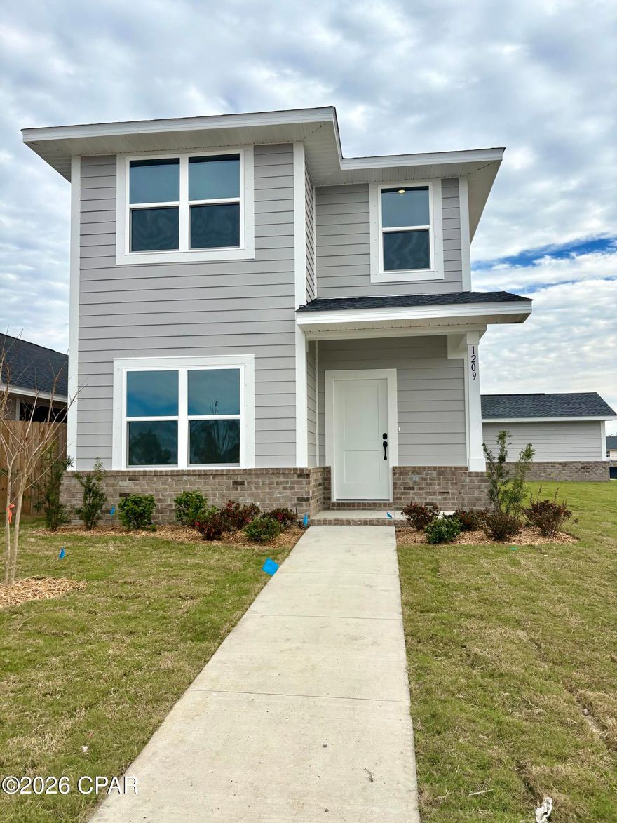 Experience the perfect blend of architectural character and functional luxury in this unique two-story residence. Designed with generous proportions in mind, the home features three spacious bedrooms—each boasting its own private full bathroom. The two upstairs suites are particularly expansive, bathed in natural light from large windows that frame stunning views of the bay. Outside, a lush side yard offers a private oasis, perfect for relaxation or entertaining.