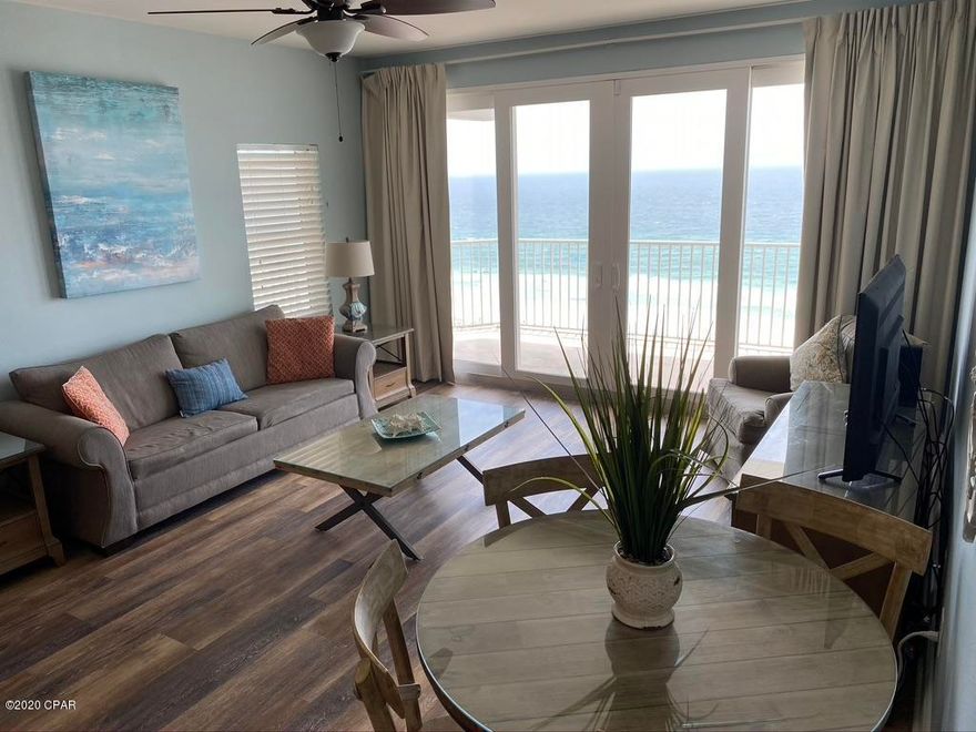 New Flooring Just Installed!!! Three Bedroom Gulf view END UNIT...with wrap around balcony with AMAZING panoramic views!!!! One of the most desirable floor plans at Laketown Wharf Resort offering the best of both worlds, as you can enjoy outdoor and indoor living space. This unit has three bedrooms, three bathrooms, plus a bunk area and your outdoor living space is not only accessible from the Master Bedroom, but from the third Guest Bedroom as well. There are a very limited number of these Gulf view floor plans available in the building, don't miss your chance to own one for you and your friends and family to enjoy or as a GREAT investment property, as this unit has a strong rental history. Laketown Wharf Resort itself  is inThe Heart Of All The Fun & Excitement In Panama City Beach – Just Steps Away From The World's Most Beautiful White-Sand Beaches, Shopping, Dining & Entertainment. This Beachside Resort Offers Unparalleled Amenities With Convenient Beach Access, 5 Unique Pools, A Kids Funscape Playground, Splash Bar & Grill, Gulf View Fitness Center & Covered Garage Parking. Laketown Wharf Offers A Variety Of Views Including The Gulf Of Mexico, Lake & Golf Course. Enjoy The Nightly Fountain & Light Show & Market Shops Along The 52,000 Square Feet Of Lakefront Boardwalk. Come See for Yourself!!!!