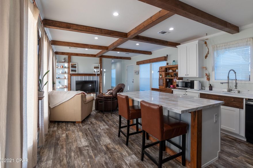 .ABSOLUTELY BEAUTIFUL almost brand new out of the ordinary home on over two acres of land with plenty of privacy!! Bring your horses, campers, boats, toys anything you have! Room for all of it!!!! Great location right of this paved yet rural road! So plenty of privacy, but close to everything! This 2.3+ acres is completely fenced in with back fencing and a pond for horses etc! Also has one horse stall already in place. You will not believe the quality of this home and also the extra details the seller has put in to make this home beautiful!!! You will be very pleasantly surprised!!! ALL SIZES ARE APPROXIMATE, BUYER TO VERIFY ALL INFO DEEMED IMPORTANT.