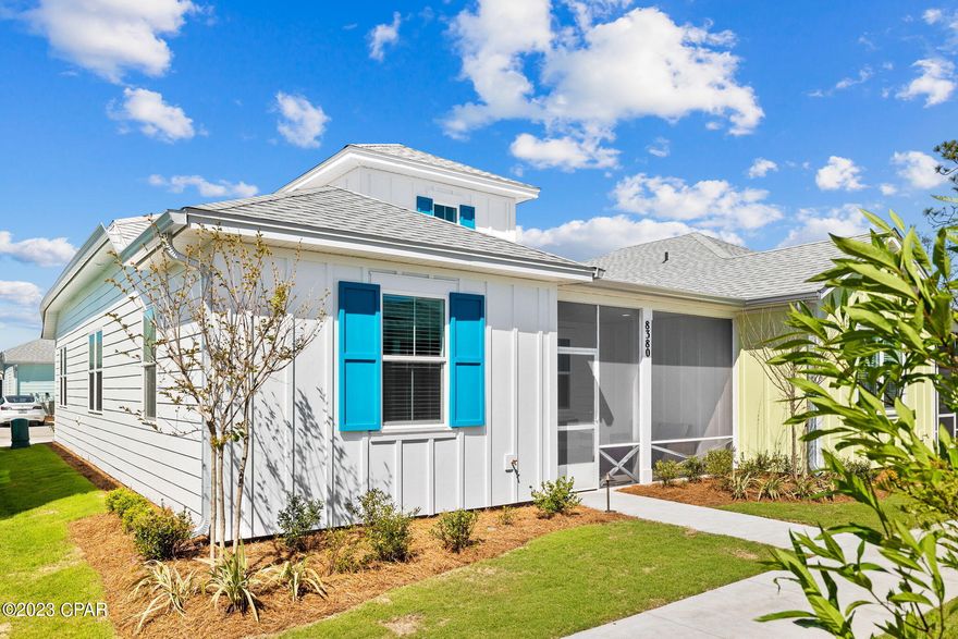 Currently under contract, seller considering back up offers. This modern, bright cottage is 2023 NEW CONSTRUCTION and being sold fully furnished so you can begin living your best life immediately in Latitude Margaritaville Watersound!

The Camelia cottage is a 2 bedroom and brand new offering over $40K in upgrades. The covered screened-in porch is so welcoming and where you'll enjoy the indoor-outliving we love in Florida for all months of the year. As you step into the vaulted living room, you'll find beautiful wood-look flooring throughout and an open concept kitchen and dining area. An extended oversized kitchen island with beautiful granite countertops is perfect for entertaining guests and sipping on margaritas! The granite is extended onto the backsplash for a seamless look and also additional upgraded soft-close cabinetry added next to the refrigerator. Offering fully equipped kitchen including a gas range and stainless steel Whirlpool appliances, this is where you'll spend most of your time in your cottage! The kitchen, living and dining is open concept and designed with gathering in mind. 

Step into the laundry and mud room from the kitchen into the private 2-car garage. Upgraded tile and cabinetry is found in the laundry along with 8' doors and upgraded recessed lighting throughout the home. 

The master suite is a true retreat with modern finishes including upgraded tile, granite countertops and walk-in shower. A large closet is perfect your full-time residence or second home in Jimmy Buffet's Margaritaville!

A guest bedroom is offered with this split floor plan and offers the same upgraded modern black and white tile and granite as the master bath.  

Do not miss this opportunity to live in this gated community without the multi-year build timeframe due to high demand! The Latitude Margaritaville lifestyle is the one you've been dreaming of. With the amenities of the community NOW OPEN you'll enjoy tennis and pickle ball courts, resort-style pools with poolside bar, Bark-a-ritaville dog park for our furry friends and a town square with restaurants and shopping and water views around! 

Connect today to start living your best life in this BRAND NEW, FULLY-FURNISHED cottage in Latitude Margaritaville Watersound on Panama City Beach, Florida! There are a tremendous amount of upgrades in this new home and in the kitchen you'll find granite countertops and backsplash, 5-burner gas drop-in range, white shaker cabinetry, under cabinet lighting, extended island countertop and more! This Camelia cottage plan has been upgraded with 8' doors throughout the interior and recessed lighting has been added to the interior and on the exterior porch. The master suite offers a large walk-in closet, granite countertops, a sliding glass shower door. The modern black and white tile, granite countertops and Moon plumbing fixtures flow through the master bath and guest bath for a seamless look. Upgraded hinges and door handles are a matte black finish throughout. The laundry room with upgraded tile gives way to a 2-car garage and a new washer and dryer with added cabinetry have been provided to the new owner! Margaritaville is a highly sought after destination in the Florida Panhandle. This new construction home is being offered fully furnished with modern, transitional pieces that is perfect for a move-in ready experience vs. having to wait to build for potential years to come! 

Latitude Margaritaville offers amenities such as pickleball, private dog park, shuttle to shopping and a future Town Square amphitheater. The fitness center and resort style pool will be completed in the coming months. Ideally located just minutes from the sandy beach, this Jimmy Buffet inspired community is a destination where it's always 5 o'clock somewhere! Inquire today to begin living your best life!
