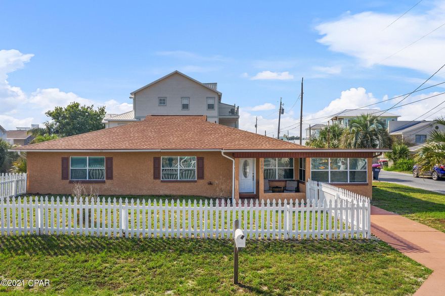 You have to see to believe!   This house can produce income as two units or as a single larger unit.  This 5 bedroom, three bath home comes completely furnished.  You can make it your home and have a mother inlaw suite or an unit for  a family member that is not ready to leave home.   This house is the perfect location for a beach rental and within walking distance to the beach.  The perfect location for boating with the Dolphin Boat Ramp close by.  Located by all of the attractions the beach has to offer such as dining, shopping and attractions.  This 2700 sq ft block house is located on two lots and has been completely remodeled for guests or for your own private getaway. The house has city sewer and water.  Property is located appromiately two blocks form public beach acess #11. Call today to tour as it won't last long.   All information is believed to be accurate and true  however it is the responsibility of the buyer to confirm all measurements and additioinal information.