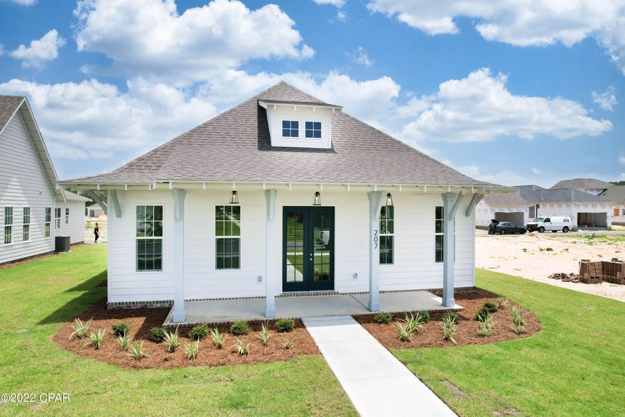 HOME IS COMPLETE AND MOVE IN READY! Beautiful craftsman style designer home in the highly sought out community of Tapestry Park. One story home is very spacious with vaulted ceilings, large kitchen with island, very large walk-in pantry, and all bedrooms with walk-in closets.  Designer added many upgrades to include wainscoting in the foyer, gorgeous shiplap in living room, quartz countertops and modern lighting. Home is equipped with smart package by Chorus and no cost to buyer for 3 years.  Less than 2 blocks from the beach and many community amenities. Move in ready- don't wait long. It will not last!