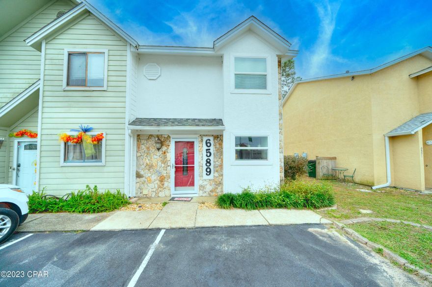 ***OPEN HOUSE, Sunday Nov 26, 12-3PM*** 6589 Harbour Bvld, 2 beds, 2 and half baths, located in a gated community on Panama City Beach. End unit for added privacy, back deck overlooks the pond in the backyard with a serene and relaxing setting. Interior has LVP floors, kitchen w/ stainless appliances, gas range, granite counters, dining and family room all open together. 2 master suites with private baths as well as full size laundry. Community pool, clubhouse, groundskeeping, cable, gated community all covered by HOA! Move in ready, assigned parking, primary residence, investment property on PCB well under 300K, Come Visit Today!