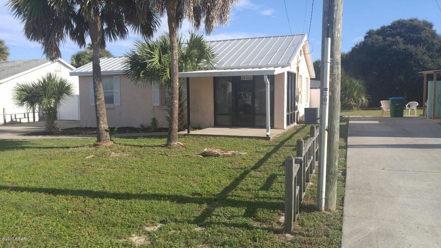 Old Style Florida Beach House that has been upgraded with electrical and Metal Roof. Home is located in the 2nd block of Bid a Wee where you will have over 2000' of pristine beach with No Condo's or Motels to block your view. Private Gated entrance to the beach makes for a safe environment. In the back yard is a Metal Portable building (20x12) that has been set up as a bedroom/and bath for the kids or guest. The large Laundry area also has Bunk Beds for extra sleeping Multi Family zoned and SHORT TERM RENTALS ARE ALLOWED !

No HOA and No Flood zone. AUGUST 2012 NEW METAL ROOF WITH EXTRA HURRICANE CLIPS .Ask your Agent for the Video Link.