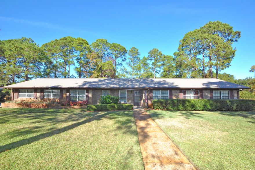 2502 W 27TH Street, Kings Point, featuring a 4 bedroom, 2 bathroom home with 2,365 square feet and a 20 x 40 inground pool! A central location with convenience to 23rd Street, Hwy 390, ten minutes from the beach side of town and 30 minutes to Tyndall AFB, 15 minutes to the Navy Base on PCB. The living room has a real wood burning fireplace, roof is new as of April 2017, current termite bond with Brock Pest Control. The lot measures 130x200 and the neighborhood has no HOA, plenty of room for a workshop, shed, pole barn, RV, etc. The water behind the home is useful for paddle boards, kayaks, etc. Come visit today!