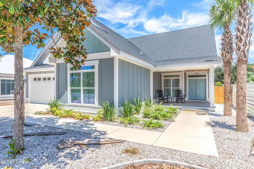 MOTIVATED SELLER - HUGE PRICE REDUCTION! BACK ON MARKET (no fault to the seller) Welcome to your new beach home! This stunning retreat is located on the serene West End of Panama City Beach. Built in 2020, this 5-bedroom house features a newly installed heated in-ground pool and a beautifully designed hardscape patio. Just a short stroll from the powdery white sands, it's the perfect place for beach living. The first floor offers ample space for entertaining, with an open-concept living room and kitchen that boasts vaulted ceilings. The master bathroom is elegantly designed with a double vanity, soaking tub, and tiled shower. With charming shiplap accents and a climate-controlled 2-car garage, this home has everything you need!
