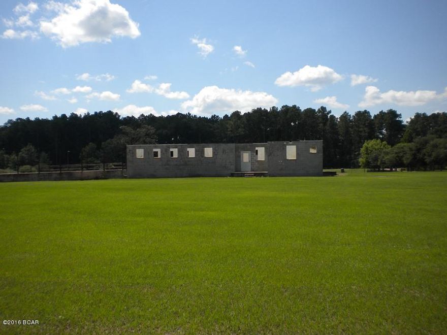 PRICE REDUCED... PLEASE SEE ALL NEW PHOTOS SINCE OLD ROOF REMOVED AND ALL DEBRIS CLEANED UP. Build your dream home in the country on the nice building lot which already has a well and septic.  Lot is flat, cleared and well maintained.  Property is completely fenced with hog wire and a barbed wire topper. New Gate just installed with access to Ryan Road.

There is an block building of approximatelly 1300 square feet from an old dairy on this property. Lots of possibilities.