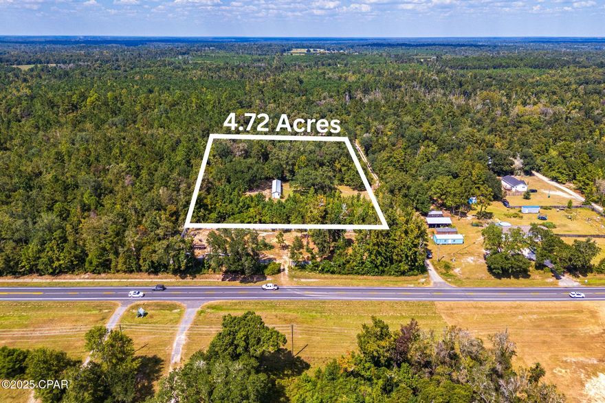 Discover 4.72 ACRES OF BUILDABLE LAND at 3174 Syracuse Ln in Marianna, FL, featuring 336+ FEET OF ROAD FRONTAGE along a quiet dirt road for both privacy and accessibility. This property already has ELECTRICITY CONNECTED and a WATER WELL AVAILABLE, with a septic system needed for future use. The lot is NOT IN A FLOOD ZONE, has NO HOA/POA RESTRICTIONS, and a SURVEY IS AVAILABLE, making it ready for development. The SELLER IS MOTIVATED, OPEN TO OFFERS, AND PROVIDING SELLER FINANCING, creating a flexible opportunity for buyers looking to build, invest, or create their own retreat. Conveniently located just minutes from US HWY 90 and downtown Marianna, with nearby attractions such as FLORIDA CAVERNS STATE PARK, HINSON CONSERVATION & RECREATION AREA, and top-rated dining like BISTRO PALMS, EL RIO MEXICAN, and MADISON'S WAREHOUSE STEAKHOUSE, this property offers the perfect balance of rural privacy and close-to-town convenience. Don't miss your chance to own A RARE PIECE OF JACKSON COUNTY LAND WITH BIG POTENTIAL!