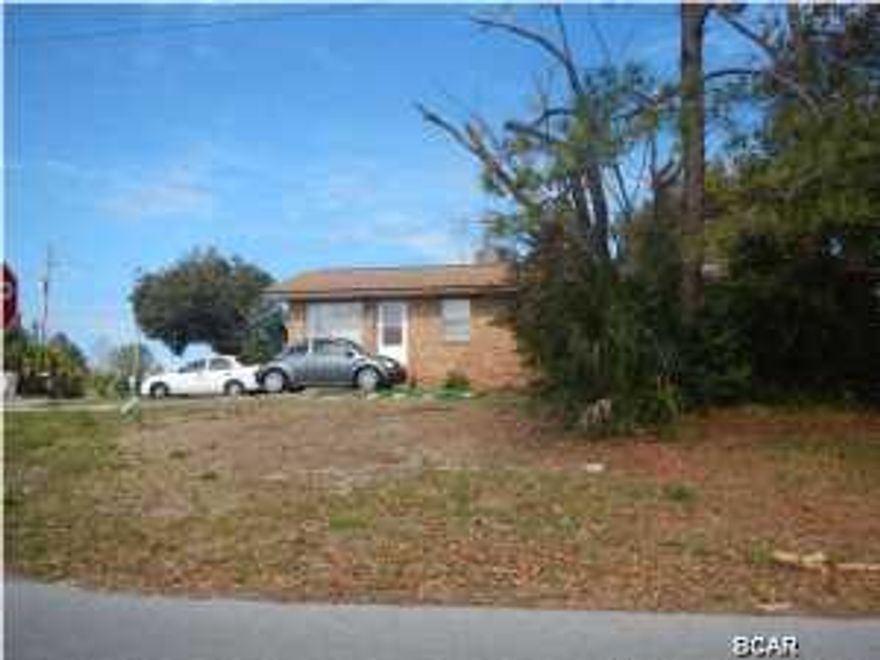 Investor opportunity near Pier Park! Don't miss this solid deal on a brick duplex in the Lullwater neighborhood within a mile of the expanding Pier Park area and half mile of the beach. Producing about $18,000 gross rental income annually; Situated on a large corner lot, the duplex is tenant occupied and has 2 bedrooms, 1 bath on each side. Refrigerator and range convey along with washer and dryer. Age, SF, and measurements are approximate; Please verify if important. Attached unit is 129 Lakeside.