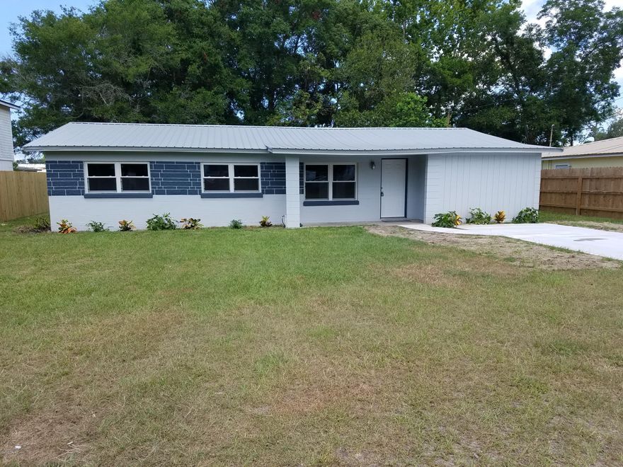 THIS HOME HAS BEEN COMPLETELY RENOVATED WITH A NEW METAL ROOF, FLOORING, AIR CONDITIONING, A/C DUCT WORK, NEW BATHROOMS, ADDITIONAL BEDROOM AND BATHROOM, NEW WATER HEATER, STAINLESS APPLIANCES, GRANITE COUNTER-TOPS, LIGHT FIXTURES, PAINT, DOORS, WINDOWS, ATTIC INSULATION, PLUMBING, CABINETS, NEW DRIVEWAY, SEPARATE STREET ACCESS AT BACK OF PROPERTY ON OLEANS LANE...THE LIST IS LONG!!! SPLIT FLOORPLAN, NO CARPET ANYWHERE TO ANTAGONIZE THOSE ALERGIES, HUGE MASTER CLOSET, LARGE ROOMS AND HUGE BACKYARD MAKES THIS A COMFORTABLE SPACE TO LIVE IN. PERFECT FOR THE BUYER WHO WANTS A MOVE-IN READY HOME. ROOM SIZES ARE APPROXIMATE FOR NOW, BUT WILL BE MEASURED FOR ACCURACY.