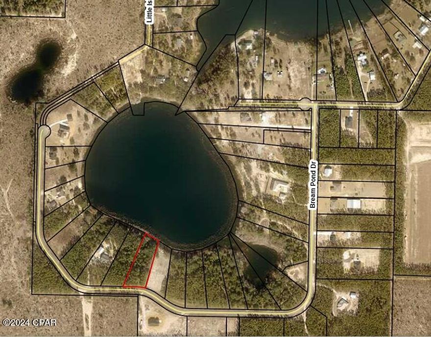 All sizes are Apx--taken from tax rolls///Motivated Seller--Make Offer!!!!REDUCED:///1.35 acres on spring fed pond. (Bream Pond)  Great neighborhood with oversized lots--super place to raise your family with room to enjoy.  Bozeman school--Kinder garden--thru--high school--fire dept (under 5 miles)--best taxes in Bay County---Paved roads--underground electrical, septic tank and well needed.