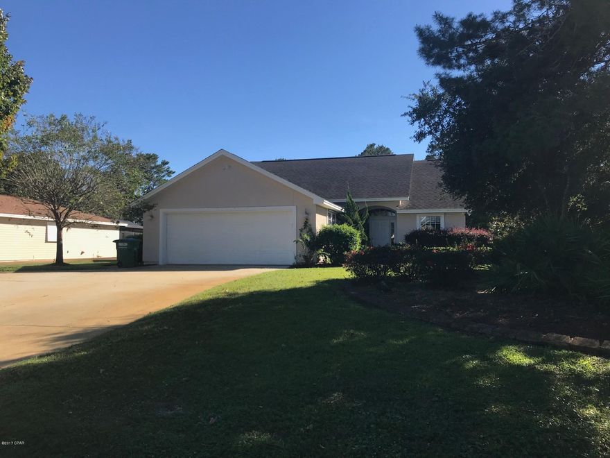 Incredible find on the West end of Panama City Beach.  This is a very well kept 3 bedroom 2 bath home located on the West End in between Back Beach and Front Beach Rd - just a short distance to the beach.  This home features laminate hard would in the living room and master bedroom, vaulted ceiling in the living room and kitchen, breakfast bar, covered patio, fenced back yard and 2 car garage.