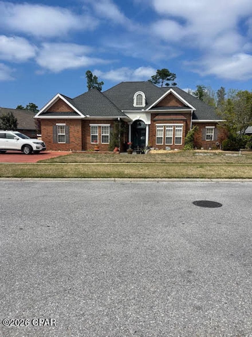 This home is absolutely gorgeous located in the popular subdivision of the Woods. Home has 2 living rooms. One off from the kitchen and one as you come in the front door. This home is tastefully decorated with stunning lighting and chandeliers. It also has an office and an extra sitting room. New roof in 2019. Back yard is a paradise for growing your own fruit. There are pear trees, peach trees, mulberry, cherry, kumquat, and persimmon trees. Very little yard to cut as pavers and extra concrete added. A perfect Lanai for grilling and sitting out side. This will not last long! Go a few blocks and you are on 23rd street for everything you will need. Wonderful neighborhood.