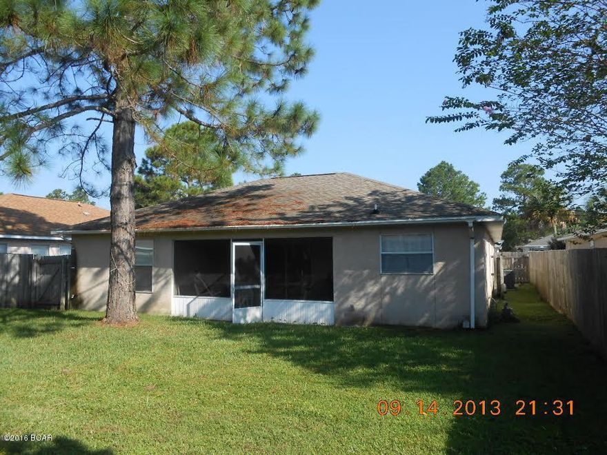 Lovely well maintained stucco home in an established neighborhood is now available. The open floor plan includes the master bedroom and bath with large walk in closet, very inviting large living area, roomy kitchen with pantry, ceramic tile and wrap around cabinets, plus 2 additional bedrooms, 1 bath & an oversized garage with 2 entry doors.  A covered back patio overlooks the privacy fenced backyard.