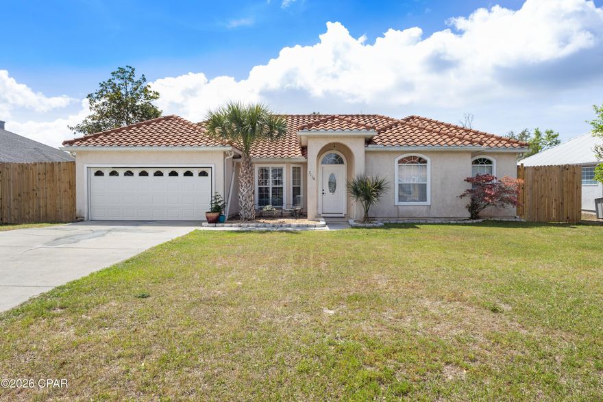 Welcome to this beautiful 4-bedroom, 2-bath home offering 1,794 sq ft of living space on a spacious .28-acre lot with no HOA. 
Remodeled in 2023, this move-in ready home features an efficient, well-designed layout that blends style with everyday functionality.
Recent improvements provide added peace of mind, including a newer clay tile roof and a high-efficiency 17 SEER HVAC system. The interior updates create an inviting space designed for both comfort and convenience.
Step outside to enjoy the fully fenced backyard featuring an 8-foot privacy fence, offering exceptional security for children and pets while creating the perfect setting for entertaining family and friends. The oversized outdoor space is ideal for gatherings, play, and relaxing at home. A double rear gate provides convenient access to the easement/drainage area with ample room for maintenance equipment, trailers, or recreational vehicles. A variety of fruit trees in both the front and backyard add charm and a touch of Florida living.
Additional value-added features include a separate irrigation water meter for cost savings and a 2-year home warranty, giving buyers added confidence and long-term peace of mind.
Nestled in a quiet, well-kept neighborhood, this home is centrally located near excellent schools, shopping, dining, and everyday conveniences. Commuters and military families will appreciate being just 10-15 minutes from Tyndall Air Force Base, approximately 25-30 minutes to the sugar-white sands of Mexico Beach, and 30-35 minutes to Panama City Beach.
All measurements are approximate and should be verified if important.