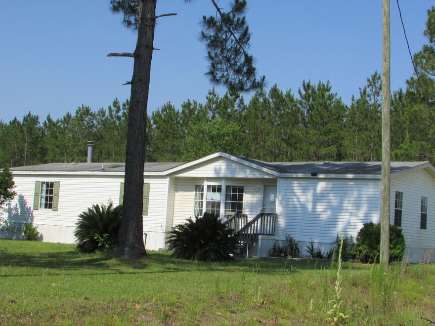 Country  Living at its Best!! Great 3 Bedroom 2 Bath DWMH located in Altha! 2 Decks overlooking  1 ace corner lot! Home needs some TLC but will make the perfect place for your family!! Priced to SELL so call today for additional info!!