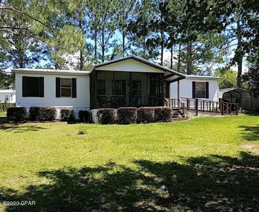 Very-well maintained mobile home with 3 bedrooms and 2 baths located on a paved road within minutes of Bonifay schools and shopping. This property has already had a home inspection and passed a USDA appraisal. It features a large master suite and a split floor plan. Nice kitchen with lots of cabinets. Home also has a second living room with a fireplace. There are screened porches on the front and back of the home and a nice fenced back yard for a garden or pool. Comes with a detached carport and a handicapped-accessible ramp. New metal roof was installed in January 2020. This home is move-in ready and ready for it's new family !!