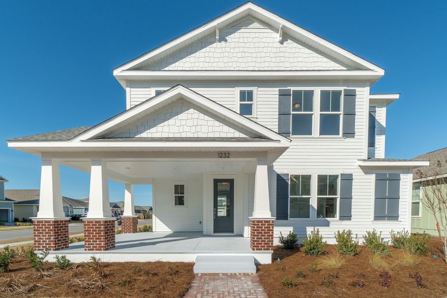 This home features the Captiva floor plan with Boatbuilder Elevation. Samuel Taylor homes are truly one of the best constructed homes in Bay County. SS appliance package is standard along with brushed nickel faucets, security system, 8 ft. doors throughout, granite counters in kitchen and baths, raised vanities with upgraded carpet with 8 lb. padding and much more. The Captiva is one of SweetBay's most popular and versatile plans consisting of 2,357 + SF along with a detached two car garage. SweetBay offers biking and hiking trails, a boathouse to launch canoes, kayaks and paddle boards, a permitted marina, community pool (construction to start 2017), several parks, ponds, children's playground, planned township with a major grocery store and many shoppes. Everything is within a 5 minute walk or less.  University Academy is the center of this beautiful community. The Academy is the #1 school for math and reading for the Bay County District. Your children are priority for enrollment with purchase of a home. Currently there are over 1000 on the waiting list to get in to the school. Come see what everyone is talking about!