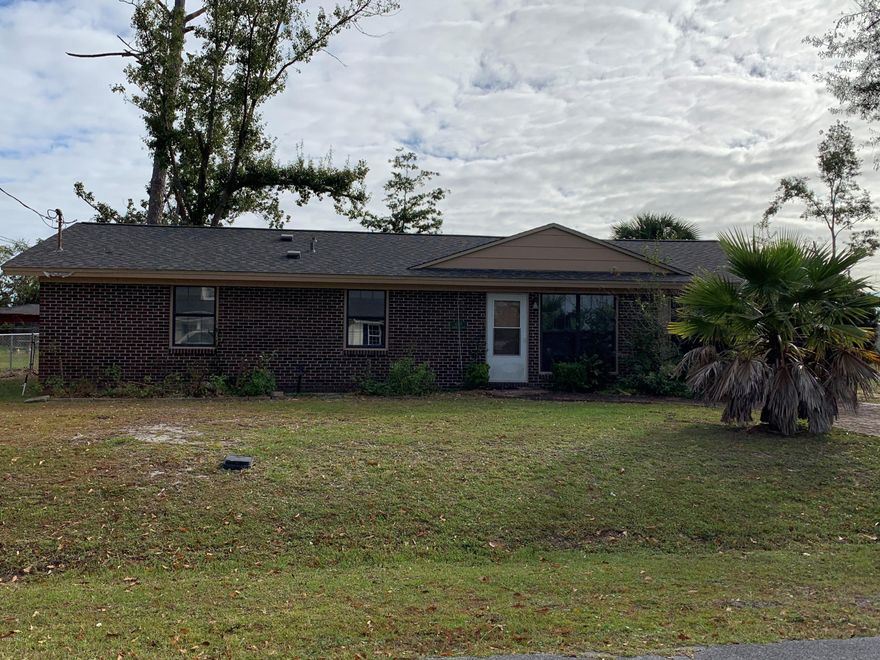 Three bedroom brick home on a large corner lot in Lynn Haven near the Country Club. This home boasts a two car garage and large mud room/pantry with built-in cabinetry and Corian countertops. Mature trees and convenient location. Home is move-in ready and offered as-is.

All sizes are approximate and should be verified if important.