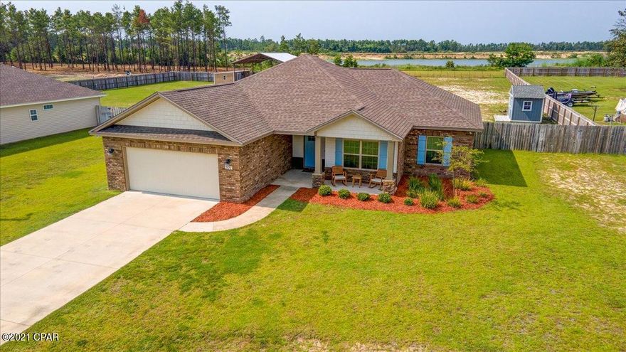 This beautiful home sits on a HUGE 1-acre lot! Great location with less than a 15-minute drive to Panama City Airport or Lynn Haven, and less than 30 minutes to PC or PCB. Very desirable neighborhood, 5 minutes away from Deane Bozeman School!



Interior of home offers upgraded lighting fixtures, LVP flooring, large living room & dining room, plenty of cabinet space, granite counter tops, large island, trey ceilings, & stainless steel appliances. Large Master suite includes convenient linen closet & walk-in master bath closet, recessed lighting and crown moldings. 



Exterior features large lot, shed, two car garage, partial sodded yard with sprinkler system, covered porch, brick and vinyl. 



Please verify all measurements if important
