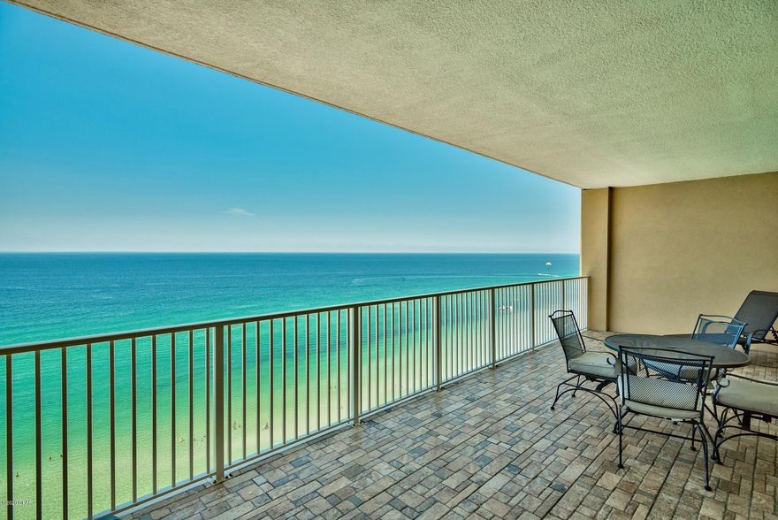 'CURRENTLY UNDER CONTRACT, SELLER ACCEPTING BACKUP OFFERS'  Tropic Winds is known for its large balconies and residential location. Unit 1806 features relaxing gulf-views, luxury vinyl tile, and elegant, tiled, balcony!  The living room and master bedroom adjoin the balcony and include quality draperies. The kitchen features wrap-around, cherry stained, cabinets and white appliances. The living room includes leather furnishings with sofa sleeper. The master bedroom includes king bed and private bath. The spacious guest bedroom features a king bed and additional access to the second bathroom. The laundry room includes a stacked LG washer and dryer. An exclusive use, assigned, parking space is included. Buyer to verify measurements if important.