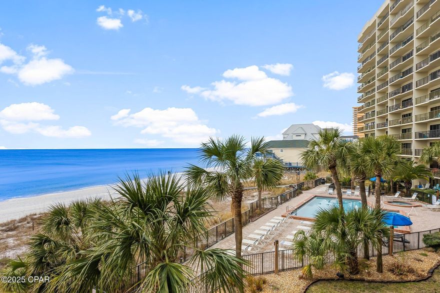 Enjoy spectacular panoramic gulf views from this stunning Commodore condo from the living room, kitchen and bedroom.  This rental powerhouse is fully furnished with an expansive and beautifully decorated balcony outside that is accessible from the living room and primary bedroom through new sliding doors with high impact glass that are quiet, low maintenance, and energy efficient.  This gated waterfront condominium on the east end of the beach is within walking distance to St. Andrews State Park with a beautiful pool and hot tub facing the Gulf and a private boardwalk to the beach.  Take advantage of the great rental income or use it as a second home or permanent residence.  After seeing the sunrise and sunset from the balcony and watching dolphins swim by, you'll never want to leave.  The possibilities are endless with this turnkey beach retreat!