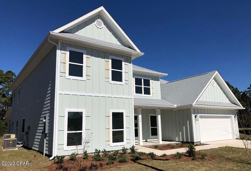 Only one ''Elliott'' left in this community! Tierra Verde is located on the desirable south side of Highway 98, providing easy access to shops, restaurants, 4.3 Miles to Naval Surface Warfare Center and 20 miles to Tyndall AFB. This Master Planned community offers coastal construction with impressive outdoor living spaces and upgraded interior features.  The ''Elliott'' plan boasts close to 4500 sq ft of living space. The centerpiece of the home is the magnificent 2-story great room, featuring vaulted ceilings and an abundance of natural light from its rows of windows. The features quartz countertops, tile showers, hardwoods stairs, EVP throughout, just to name a few. This energy efficient home offers ''Home is Connected'' Smart Home package, DEAKO switches, 1-year builder warranty. Pictures, photographs, floor plans, elevations, features, colors and sizes are approximate for illustration purposes only and will vary from the homes as built. Home and community information including pricing, included features, terms, availability and amenities are subject to change and prior sale at any time without notice or obligation.