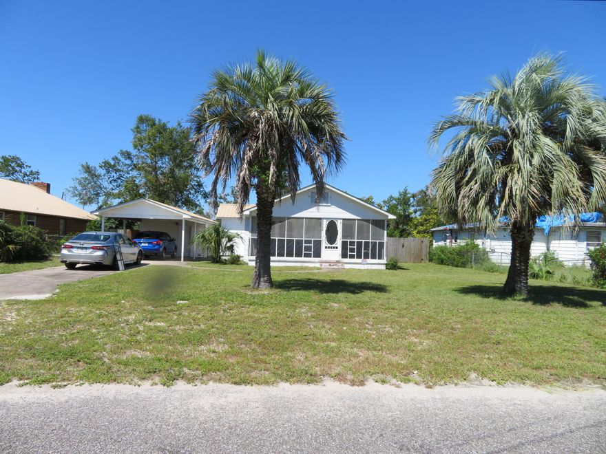 Check out this adorable but sturdy St. Andrews cottage that withstood the hurricane with little damage!  It did get a new roof that is 26 gauge steel, stronger than most.  The home is move in ready!  Enjoy 2 spacious bedrooms & 2 separate sitting areas.  It even includes the furnishings so just bring your clothes and you're set.  You'll love the screened in front porch that is even wired for TV to enjoy those Fall football games outside.  There is also a 7x14 secure storage building/laundry area which has an outdoor shower off of the back.  The yard is spacious and fenced with room to park your boat.  There is also a carport.  All this just a bike ride to the St. Andrew's area restaurants, shopping and marina to enjoy the Florida life.   2nd home- No problem...it has video security too!