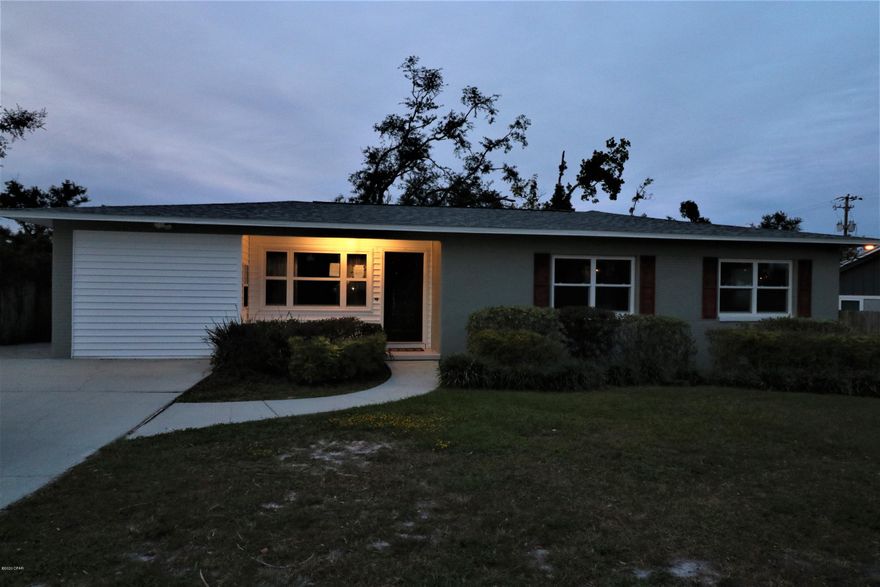 Beautiful Cove Home features 4 bedrooms and 3 full baths, split floor plan! Master Suite is a newer addition with a large master en-suite featuring 2 walk-in closets, soaking tub, separate shower and separate vanities, so no worries of being in each others way!  Home was previously renovated. Roof is only 2 years old, Tankless water heater is about 4 1/2 years old, new privacy fence with double gate in the back with alley access, brick pavers and concrete area for outdoor entertaining, a block from the water and a short walk or ride to the Yacht Club. Thank you for considering this lovely home, call your favorite Realtor and schedule your private showing today! Please verify all information and measurements if important Please verify all information and measurements if important