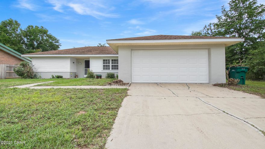 Awesome 3 Bedroom 2 Bath, Lakeview Home with Garage! This home has been recently remodeled with new flooring, paint, and fresh landscaping. The home features a split floorplan with living room, den, dining area, and sunroom. The master suite and bath features a tiled walk-in shower, water closet, and single oversized vanity. Outside the property also features a large back yard, a workshop, and fencing. Home is located just a short drive from the boat ramp, for easy Lake access! Schedule your showing on this home today!