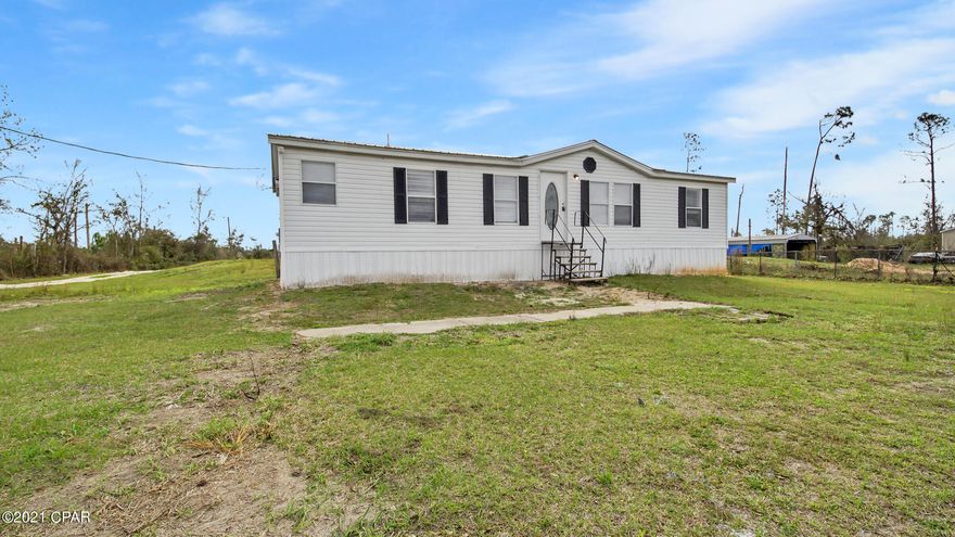 Awesome, remodeled Bank Owned home on just under 3/4 of an Acre! This 3 Bedroom 2 Bath home features a split floor plan with new carpet and paint throughout. Seller is also having new kitchen appliances installed. This home is located in the quaint Bayou George area, approximately 30 minutes from The Worlds Most Beautiful Beaches in Panama City Beach. Schedule your showing today!