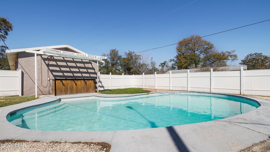 CURRENTLY UNDER CONTRACT, SELLER WILL CONSIDER BACKUP OFFERS Welcome to this beautifully updated 3-bedroom, 2-bathroom pool home, located on a spacious corner lot in Southport. Renovated in 2022, this home offers modern living with a range of recent updates, including a new water heater (2024), well pump (2025), AC unit (2021), and roof (2019). Inside, you'll find an split floor plan with LVP flooring throughout, a remodeled kitchen with newer appliances, and a master suite featuring a walk-in closet. The home is bright and inviting, perfect for both everyday living and entertaining. The real showstopper is the backyard! Enjoy your own private oasis with a 30' pool, large pool deck, and a pergola ideal for gatherings. The backyard also provides ample space for storage, a shed, or additional parking. Conveniently located just minutes from Southport Elementary School and  nearby boat launches, this home combines comfort, modern updates, and accessibility. Don't miss the chance to own this exceptional property—schedule your showing today!