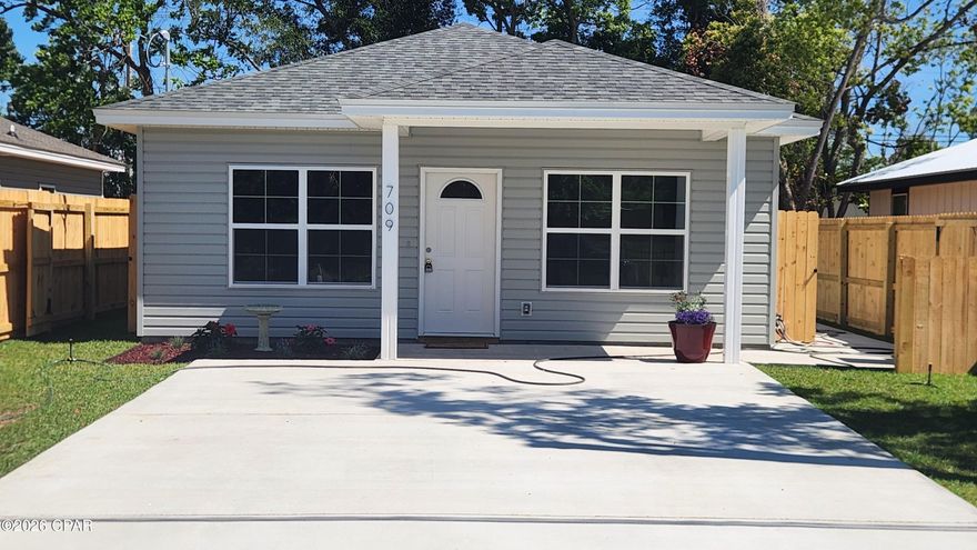 This beautiful new construction home is located in the heart of Panama City. The exterior features a covered porch, 25 ft by 7 foot side patio, and good sized  fully sodded & privacy fenced yard with plenty of space for all your outdoor activities. The interior features an open floor plan with 9 foot ceilings throughout, Mohawk luxury vinyl plank flooring, beautiful quartz counter tops, stainless steel appliances, a stainless steel farmhouse sink, a nice island, and plenty of windows for natural light. The master bedroom features a walk in closet with en suite bath with a double vanity and walk in shower. Quality local construction by Danny Sullivan Inc. serving Bay County for over 40 years. Call your Realtor TODAY to see this great home.

Interior photos  are from a previous build with the same color/ fixture options. Expected Completion May 5th.