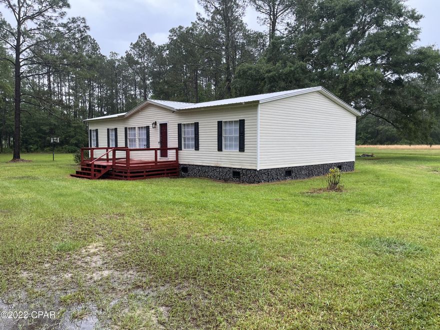 **Professional photos coming soon**



Looking for somewhere nice and quiet? This wonderful mobile home is located in Graceville, FL just minutes away from shopping areas in the beautiful Downtown Chipley. This mobile home just had new carpet put in the bedrooms and the living room, new vinyl flooring put in the kitchen, bathrooms and laundry room. Want to a place to sit and enjoy the outdoors? If you go through the laundry room you step out onto a covered and screened in porch. This property also sits on 1 acre of land so plenty of room to put a shed, another outdoor sitting area or whatever you can imagine. Don't miss a great opportunity - schedule a time today to go see this home!