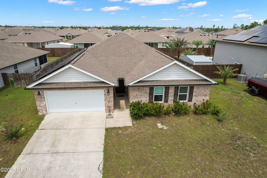 Welcome to 3946 Alva Thomas Rd, nestled in the serene Magnolia Hills subdivision of Panama City, FL 32404. This stunning craftsman style home offers: 4 bedrooms & 2 baths in a spacious layout ideal for growing families or home office flexibility.

Built in 2019, with low maintenance brick and vinyl exterior and a practical slab foundation.

Open concept living featuring durable LVP flooring flooding the great room, dining area, and kitchen great for everyday living and entertaining.

A generous kitchen with island, stainless steel appliances, pantry, and abundant cabinet space.

A luxurious primary suite, complete with a large ensuite bath and spacious walk-in closet for your retreat.


Premium finishes include stainless steel appliances, LGV floors, recessed lighting, and fast AT&T fiberoptic internet connection.

Outside, you'll appreciate: A fully fenced backyard with an 8ft privacy fence perfect for pets, gatherings, or serene relaxation.

100% PAID OFF solar panels, dramatically lowering energy bills and boosting eco efficiency.
