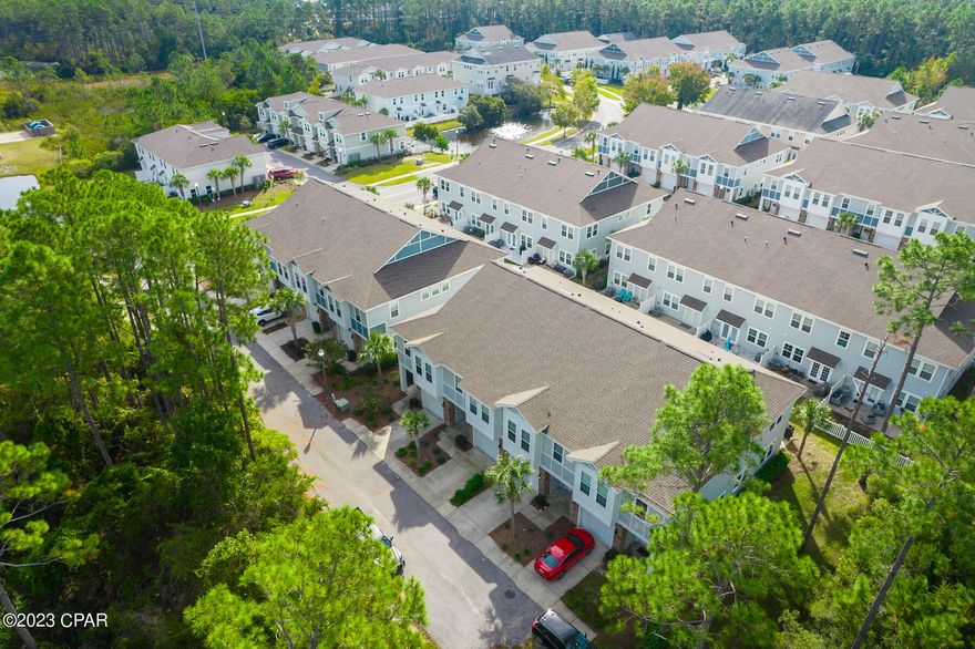 SELLER OFFERING Special 10K CONCESSION towards rate buy down with approved contract! Welcome to this amazing townhome listing located in a vibrant community, offering a plethora of amenities and conveniently located near some of the best attractions in town. This townhome truly offers the best of both worlds - a peaceful retreat with all the excitement just moments away.

Home has brand new carpet and fresh paint. Tiled master shower with garden tub. Master walk in closet is huge. Enjoy cooking in the kitchen while hosting your guest in the great room. High ceiling makes this place seem even larger than it is. 

One of the highlights of this community is the sparkling swimming pool. Whether you want to take a refreshing dip on a hot summer day or simply lounge by the poolside, this amenity provides the perfect place to relax and enjoy the sunshine.

For those who love outdoor activities, the community also features fishing ponds, allowing you to cast your line and enjoy some quality time connecting with nature. Imagine spending a lazy afternoon fishing and soaking up the tranquility of your surroundings.

Located right across the street from Arnold High School, this townhome offers a convenient location for families with school-aged children. This close proximity ensures a hassle-free commute, making it easy for students to attend classes and extracurricular activities.

In addition to being near the high school, this townhome is also just a short distance from the pier and Shipwreck Island Waterpark. Spend weekends enjoying thrilling water slides and lazy river rides, or explore the vibrant local pier with its bustling atmosphere and stunning views.

With its ideal location, this townhome allows you to experience the best of coastal living. Enjoy the convenience of being close to dining options, shopping centers, and other local attractions, while still having a peaceful and comfortable place to call home.

Don't miss out on the opportunity to live in this fantastic townhome and experience the amazing amenities and attractions that surround it. Schedule a showing today and see for yourself why this property is perfect for you. New carpet and fresh paint.