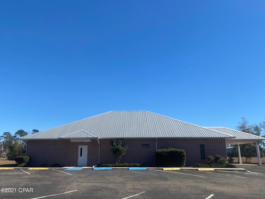 Spacious Professional Office consist of 5 offices, reception area, large conference room, kitchenette plus a full kitchen, multiple closets throughout and handicap accessible restrooms.  The ladies restroom has 2 stalls.  The men's restroom has 1 stall plus a urinal.  Two of the offices feature private baths and one has a shower.  The all brick building  has a new roof, new floor covering and other updates.  There is a portico at the conference room entrance.  22 paved parking spots.   Located close to Signature Healthcare and the VA Clinic.