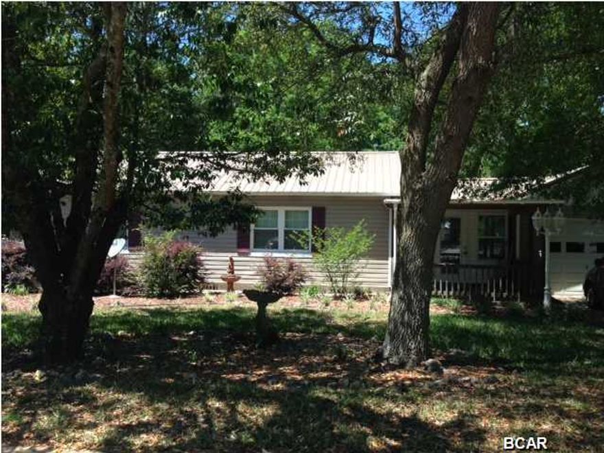 Well maintained home near shopping, dining, and schools. Exterior of home was updated last year with new vinyl siding giving it beautiful curb appeal. This 840 sq ft home sits on a large lot about 0.348 of an acre. This home has an open living area letting in natural light through the entry sitting area and kitchen. Home was built in 1948, so has the charm of an older Florida home. New metal roof only a year old! Brand new high impact windows installed just one year ago. Sprinkler system on well and pump and 7 zones-waters front and back yard. New A/C installed just a month ago. Two storage areas, larger storage area has electric. Great investment or home for first time home buyer! Gazebo has electric and cable running to it-perfect for lounging. Yard has a Meyer lemon tree,