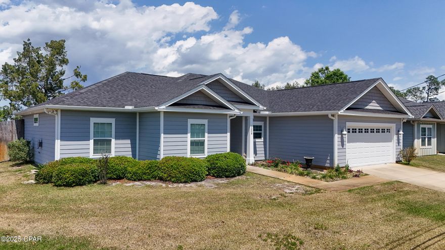 Stunning 4-Bedroom Home in the Heart of Lynn Haven - Looking for your dream home in peaceful Lynn Haven? This beautifully maintained 4-bedroom, 2-bath home, built in 2018, offers all the comforts you need.  From the freshly painted interior to the luxurious finishes throughout, this home is ready for you to move in and make it your own.  Key features include generously sized rooms with abundant natural light and stylish LVP flooring throughout the home.  The beautifully designed kitchen has hard surfaced counter tops, a farm sink and recessed lighting.  The master bathroom features an upscale tile shower, a double vanity and garden tub. There are tray ceilings in the living room and master bedroom and 9' ceilings throughout the house.  A whole house generator eliminates the worry of power outages, and the private well-manicured back yard is ideal for outdoor gatherings.  The large two car garage provides ample space for parking and additional storage.  Speaking of storage, the attic space above the garage is decked and easily accessible.  Showing appointments are easy to schedule.  Call your agent today.
Measurements are approximate.