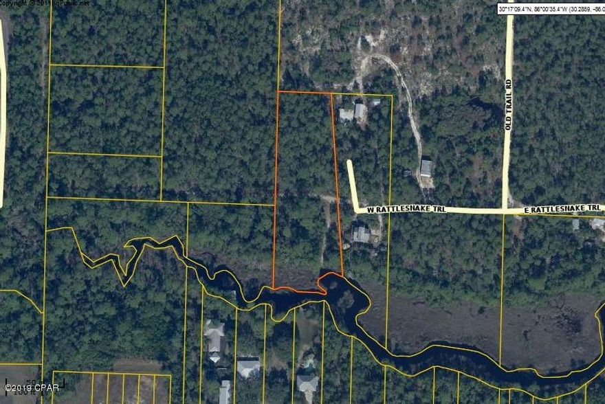 Real Estate Owned REO. Beautiful waterfront property on a creek that leads into Lake Powell, the largest dune lake in northwest Florida. This is just over 2 acres with approx 240' on the water. This area is approved for single family residences. Wild Heron, home to the famous Shark's Tooth Golf Club is nearby as is, Osprey Creek. You're also convenient to the beach, shopping centers, and more. All info is approx and must be verified by Buyers if important.