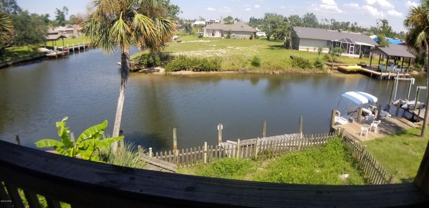 Waterfront townhouse on a canal with direct access to the bay ! NO HOA FEES. This home allows you to drop your boat into the canal and wisp into the bay for Shell Island. 

Updated kitchen and baths. Needs sheetrock and other repairs. Great fixer upper, rental or flip for investors



Washer and Dryer are not included! Seller is keeping these appliances and some other personal belongings