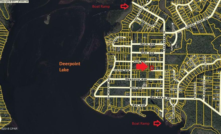 Come take a look at this big, buildable lot right next to Deerpoint Lake.  You will find this property sits moments away fron two public boatramps/parks, within 1/2 mile.  This lot features a paved road, power pole, parking slab, prior well and septic tank.  The property also has a shop in back and a small apartment like structure with facilities that can be used to supplement your home, man cave, office or as a mother in law style apartment.  Feel free to drive by and take a look.
