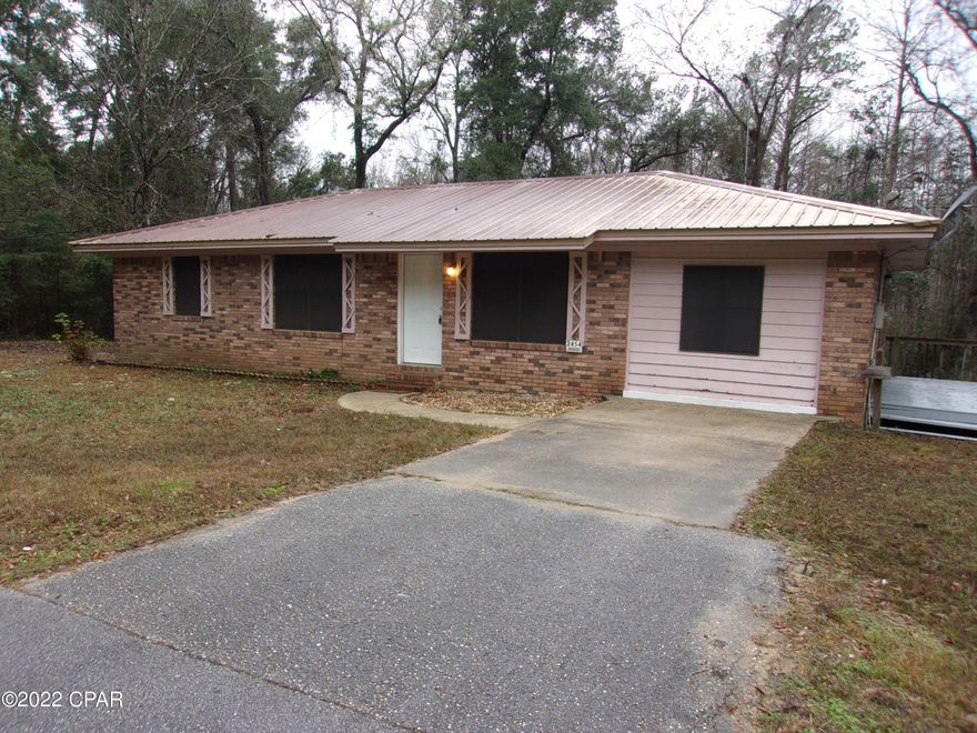 'CURRENTLY UNDER CONTRACT, SELLER WILL CONSIDER BACKUP OFFERS - 3 Bedroom 1.5 bath Brich Ranch style home on 1+ Acres. Has nice size living room and a Den with built in shelves.  Large kitchen/Dining room combo. Newer counter tops and cabinets. Newly painted inside. Good sized bedroom. Home is in excellent condition. Has electric central heat and air.  Lots of closet space and storage space. Large laundry room. Large deck attached. Metal storage building.  Located on paved road in nice and quiet area. Not far to several towns, even in Alabama. Check it out today. Ready for a new family.