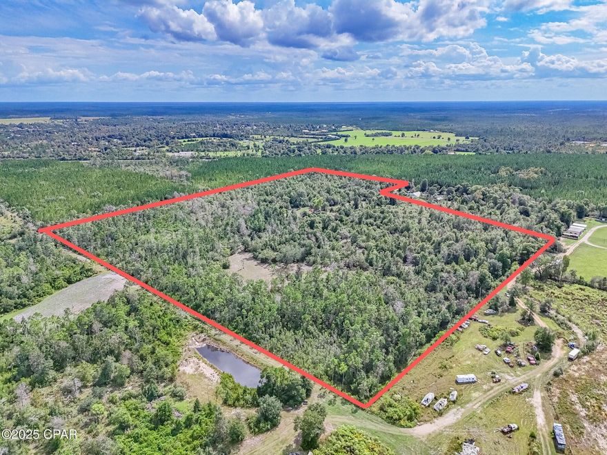 Selling 38 acre vacant parcel land located in Youngstown, Fl off N. Campflowers Rd. Country living In Close proximity to all the amenities. Has deeded ingress and egress easement. Features an artesian spring that produces water all year long and runs out the back of the property. Has cleared trails and a very old house that has a well in it (don't know condition) not livable. Electricity ran to the frontal property. Surrounded by a tree farm on 2 sides. Location proximity: Pro gear convenience store/gas: <1mile, Publix grocery: 9.3 miles,  Starbucks: 9.3miles, HCA ER: 11miles,  HCA Gulf & Ascension Sacred Heart Hospital: 15mil,  Tyndall AF base: 21miles , Navy base: 23 miles, Pier park 29.3 miles