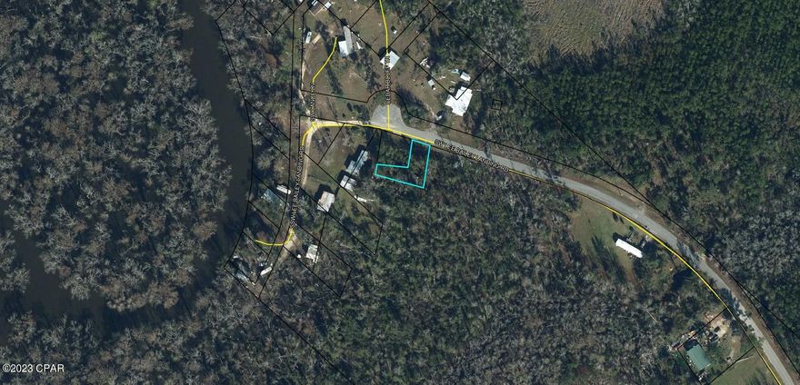 Located along the Chipola River, this lot would make for a great camp or home site.